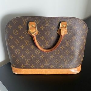 Authentic Louis Vuitton Alma Bag with Lock